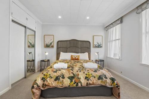 Katil atau katil-katil dalam bilik di Kia Ora Apartment