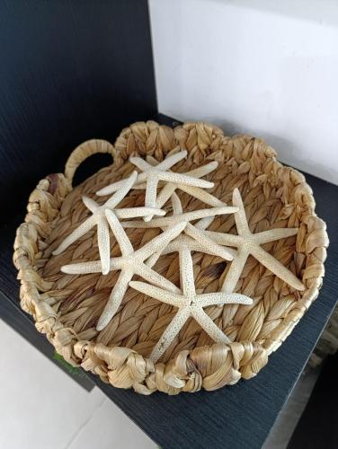 a cake with wooden stars on top of it at TH with private pool in Pampatar, Venezuela in Pampatar
