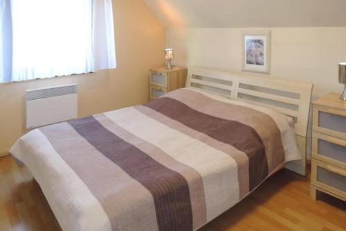 Postel nebo postele na pokoji v ubytování Holiday Home in Lukecin near Baltic Sea