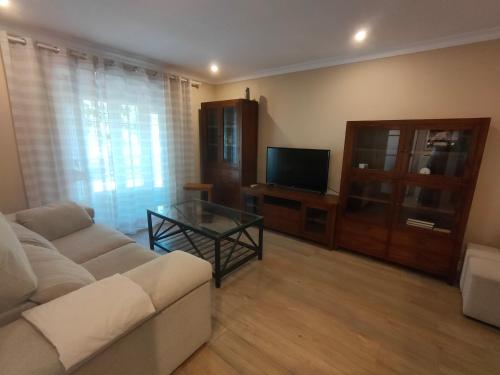 TV a/nebo společenská místnost v ubytování Adosado 160 metros, proximo a la playa y muy espacioso