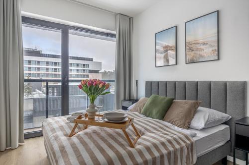 Ένα ή περισσότερα κρεβάτια σε δωμάτιο στο 2HomeRent Shellter 117M