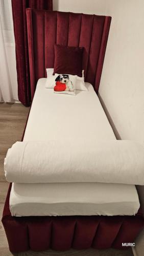 Ein Bett oder Betten in einem Zimmer der Unterkunft Apartmani MURIC Ljubljana