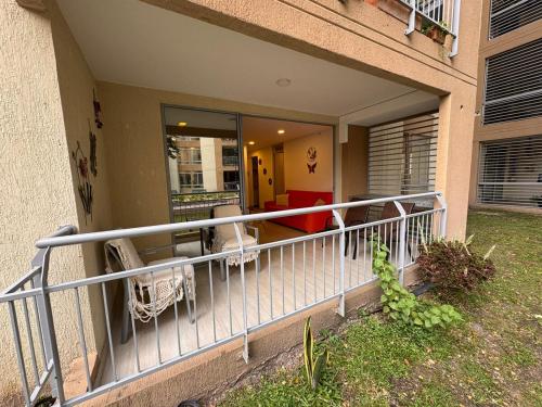 a balcony of a house with a railing at Apartamento en Villeta Hermoso in Villeta