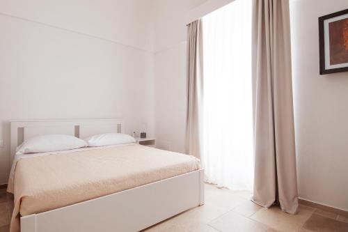 Katil atau katil-katil dalam bilik di Palazzo Grecale - ApulianStay Group