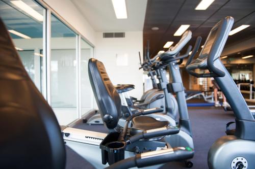 a row of cardio machines in a gym at Wyndham Resort Torquay in Torquay