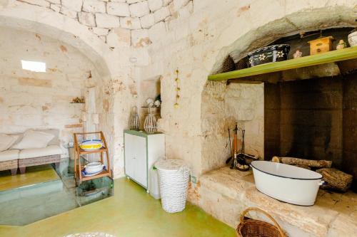 Ένα μπάνιο στο Ostuni trullo di charme