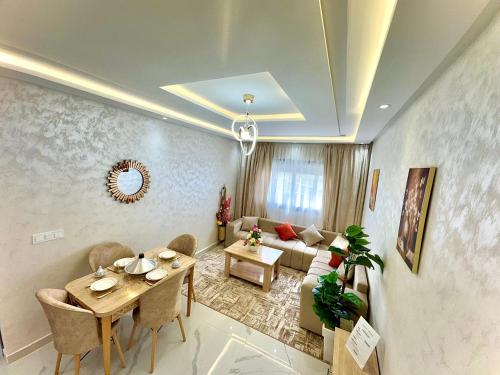 Posezení v ubytování Appartement Lumineux et élégant