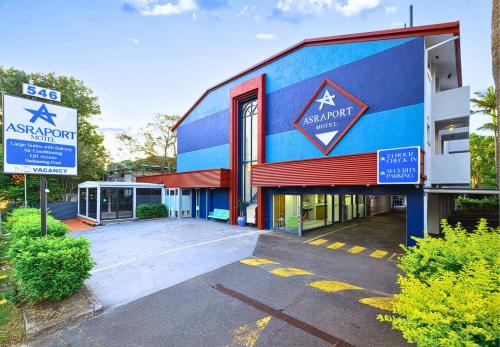 a parking lot in front of a building at Asraport Motel in Brisbane