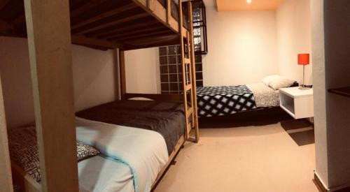 Postel nebo postele na pokoji v ubytování LOFT CHAKRA