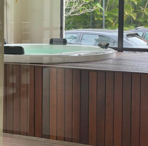 a pool table sitting on top of a building at Barra Family Resort com piscina e spa, 2 quartos in Rio de Janeiro