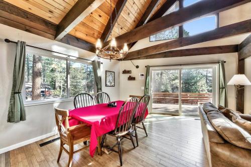 a dining room with a red table and chairs at Stay Cool! AC - Foosball - Nature Escape in South Lake Tahoe