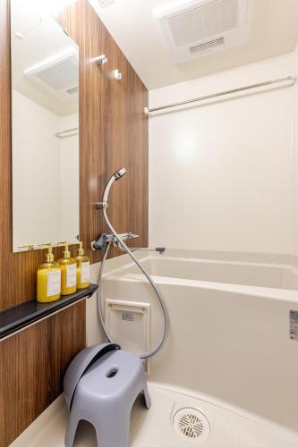 a bathroom with a shower with a toilet in it at 浅草橋201 in Tokyo
