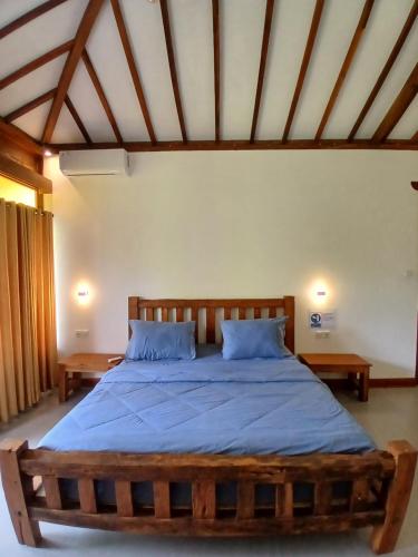 Postel nebo postele na pokoji v ubytování Villa Sophie Lombok