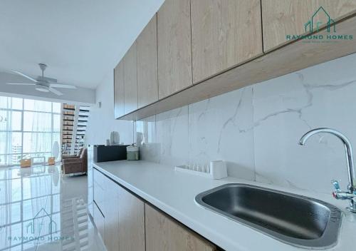 Kuchyň nebo kuchyňský kout v ubytování Maritime Sea View Duplex