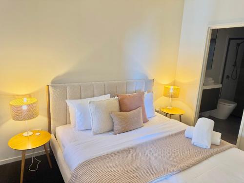 Katil atau katil-katil dalam bilik di Harbour Towers, Newcastle's Elite Apartment Stays, Free Parking & Tram Access