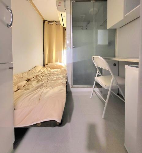 Ένα ή περισσότερα κρεβάτια σε δωμάτιο στο Ivy Residence