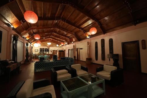 an overhead view of a living room with couches and chairs at Carabao Island Observatory and Think Tank in San Jose