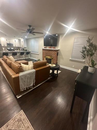 a living room with a couch and a fireplace at Home in North Wilmington in Wilmington