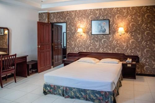 Katil atau katil-katil dalam bilik di Melin Hotel Tanjungpinang