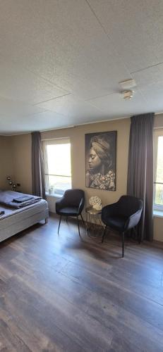 Postel nebo postele na pokoji v ubytování Hotel 'De Heren'