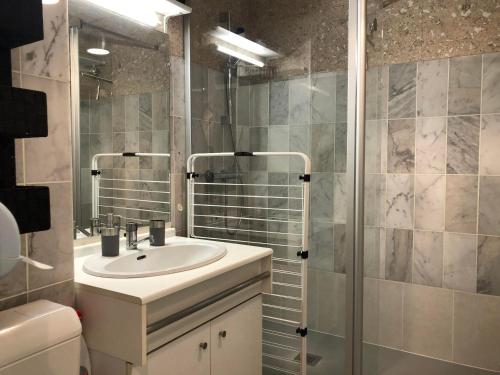 a bathroom with a sink and a shower at Studio cosy avec balcon, idéal pour 2 pers, Chatelaillon-Plage - FR-1-706-32 in Châtelaillon-Plage