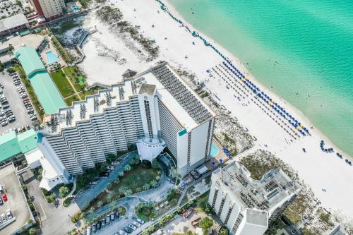an overhead view of a hotel and the beach at Pelican Beach Resort Destin in Destin