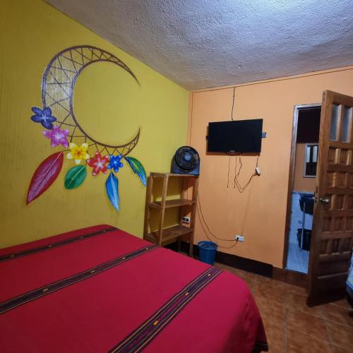 Ένα ή περισσότερα κρεβάτια σε δωμάτιο στο Hotel Encuentro del Viajero