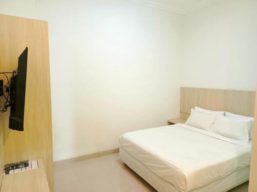 Katil atau katil-katil dalam bilik di Kyrie Hotel