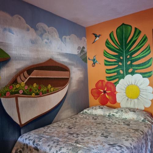 Ένα ή περισσότερα κρεβάτια σε δωμάτιο στο Hotel Encuentro del Viajero