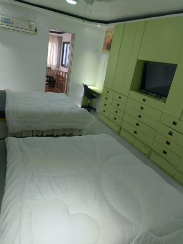 Katil atau katil-katil dalam bilik di Big room with two queen bed