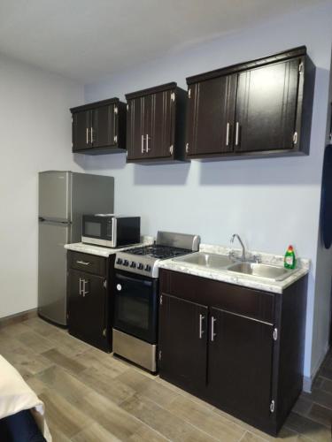Η κουζίνα ή μικρή κουζίνα στο La baja housing