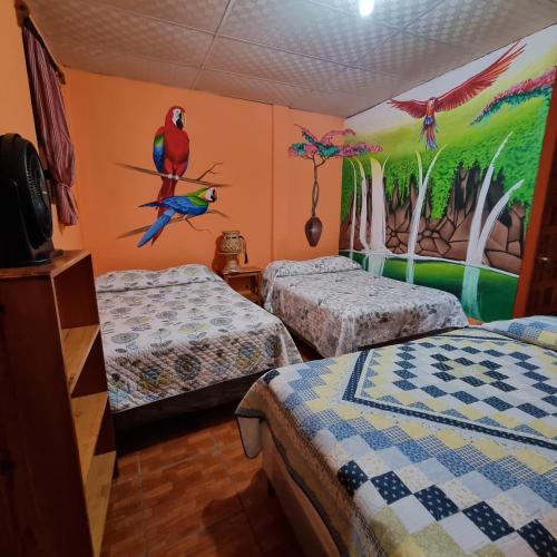 Ένα ή περισσότερα κρεβάτια σε δωμάτιο στο Hotel Encuentro del Viajero