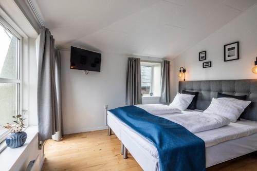 Postel nebo postele na pokoji v ubytování Marsk Hotellet