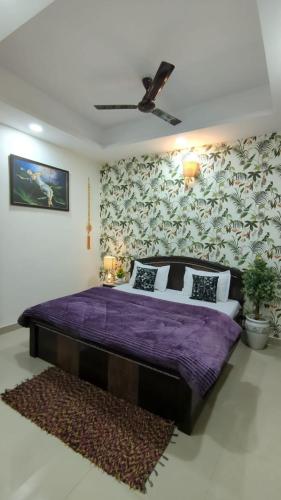Katil atau katil-katil dalam bilik di Kridha Unique and Peacefull villa