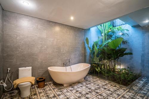 Ένα μπάνιο στο Tropicasa 2 by Bali Villa Solutions