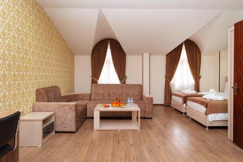 Кровать или кровати в номере Diamond Hotel Tashkent