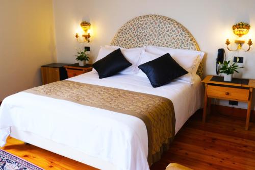 Hotel Villa Ca Damianiにあるベッド