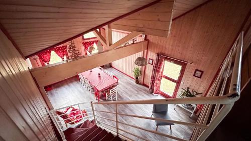 an overhead view of a staircase in a cabin at Chalet familial à Vagney + Jardin et Terrain de Bowling in Vagney