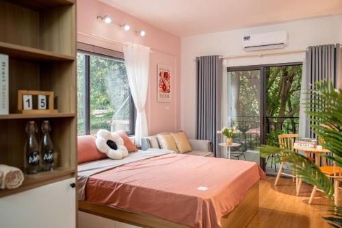 Postel nebo postele na pokoji v ubytování LaHomestay Khuất Duy Tiến