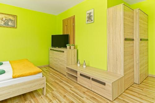 Postel nebo postele na pokoji v ubytování Apartament w Domku Wojków - Kowary koło Karpacza