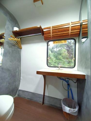 Koupelna v ubytování โรงแรมบ้านนายถึกและร้านอาหาร
