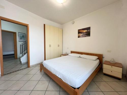 En eller flere senge i et værelse på 48 Trilocale vista mare