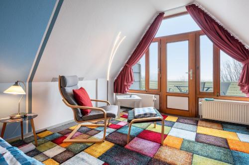 Ένα ή περισσότερα κρεβάτια σε δωμάτιο στο Ferienwohnungen Andresen