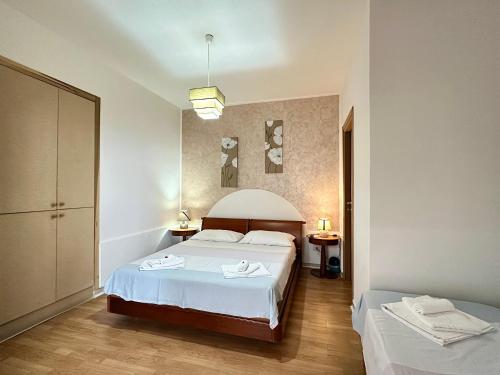 Postel nebo postele na pokoji v ubytování B&B Verzavò
