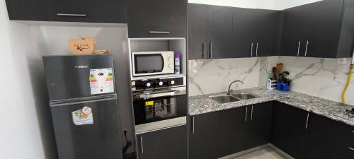 Η κουζίνα ή μικρή κουζίνα στο Apartment Rental F3 with sea view