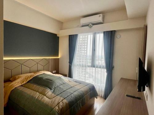 Ένα ή περισσότερα κρεβάτια σε δωμάτιο στο 3 Bedroom Duxton Sky House BSD