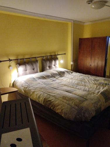 Ένα ή περισσότερα κρεβάτια σε δωμάτιο στο B&B LA MARMOTTA