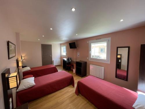 Postel nebo postele na pokoji v ubytování Brit Hotel St-Quentin/Nord