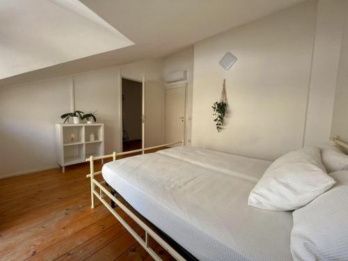 Ένα ή περισσότερα κρεβάτια σε δωμάτιο στο 71 Villetta indipendente con giardino