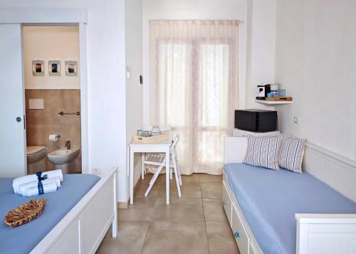 Postel nebo postele na pokoji v ubytování Casa del mare